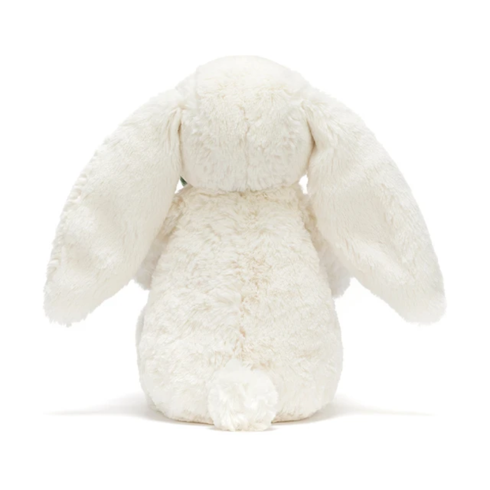Cream bunny plush toy holding a plant – view 4
